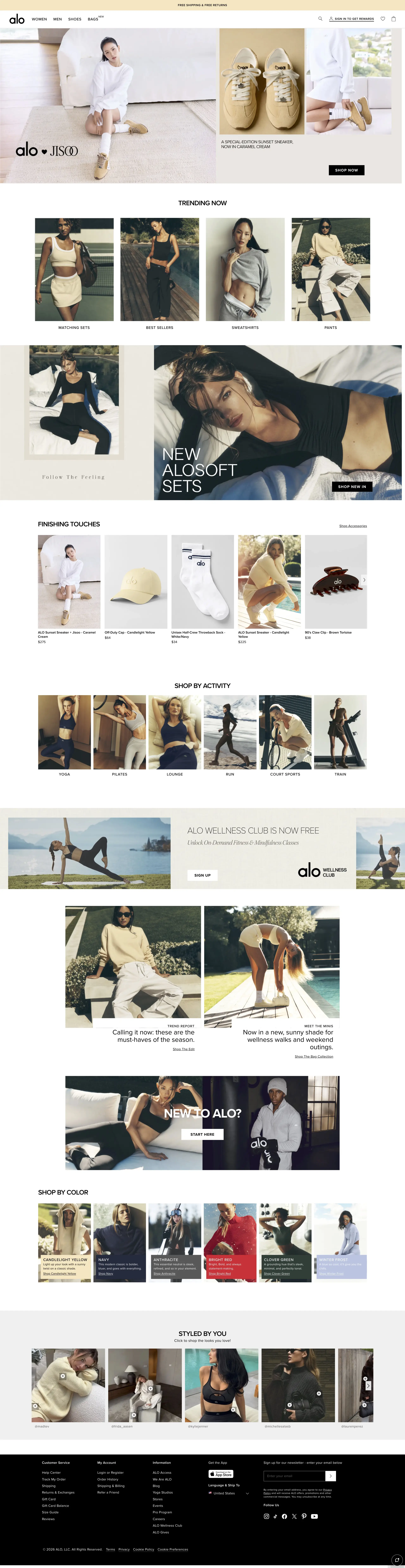 Alo Yoga Shopify store homepage displaying premium yoga activewear and wellness lifestyle products